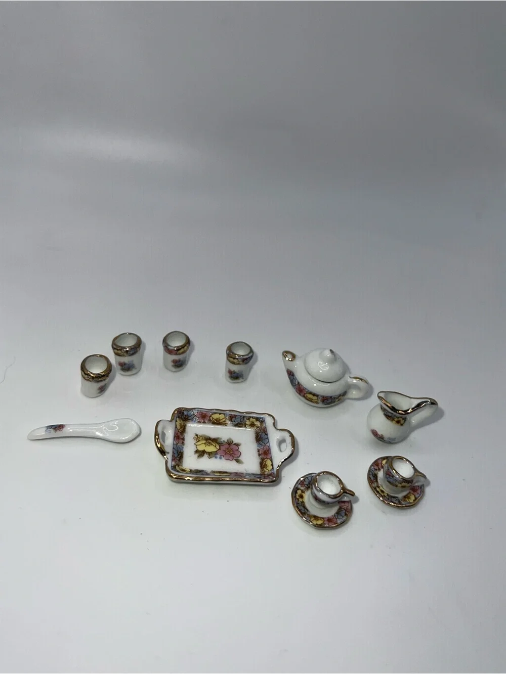 Miniature Porcelain Tea Set with Floral and Gold Trim